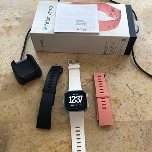 Fitbit Versa with 3 bands.